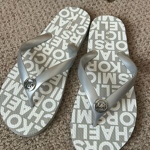 Michael Kors beachy flip flops
